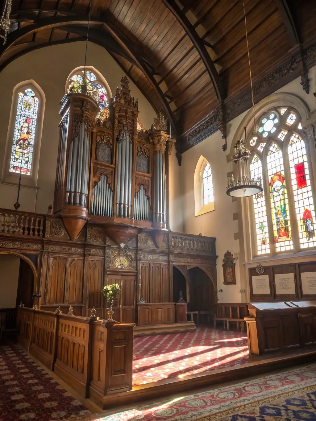 A photograph capturing the vibrant atmosphere of a recent organ concert, showcasing the organist mid-performance and the captivated audience in the Bernieres-le-Patry church.